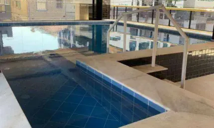 Apartamento com 2 dormitórios à venda, 62 m² por R$ 408.000,00 - Boqueirão - Praia Grande/SP