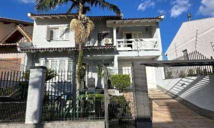 Belíssimi sobrado com 3 dormitórios à venda, 200 m² por R$ 949.990 - Vale do Sol - Cachoeirinha/RS