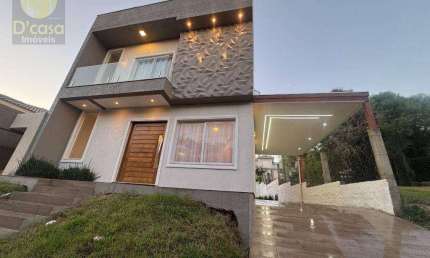 Excelente sobrado com 3 dormitórios à venda, 110 m² por R$ 919.000 - Cadiz - Gravataí/RS