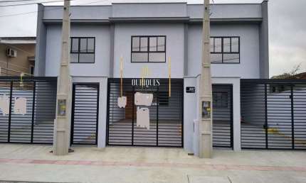 Excelente Sobrado Geminado no Guanabara com 105m², 3 quartos e 2 vagas.