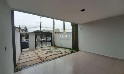 Geminado com 3 quartos sendo 1 suíte, 2 vagas de garagem e 6 mt fundos