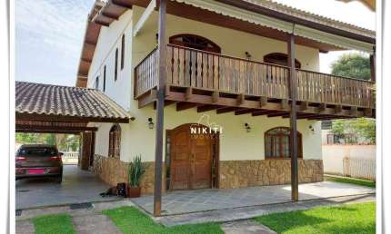Casa com 5 dormitórios para alugar, 400 m² por R$ 4.687/mês - Jacaroá - Maricá/RJ