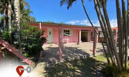 CASA COM AMPLO TERRENO EM ZONA DE MORADORES, OSÓRIO-RS