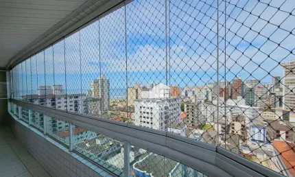 Apartamento com 3 dormitórios à venda, 134 m² por R$ 750.000,00 - Vila Guilhermina - Praia Grande/SP