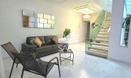 Casa com 2 dormitórios à venda, 120 m² por R$ 695.000,00 - Caiçara - Praia Grande/SP