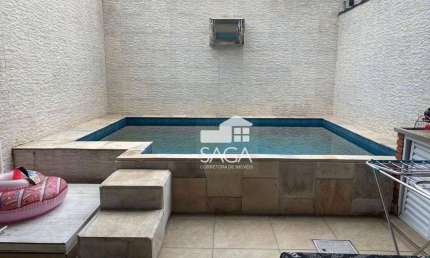Casa com 3 dormitórios à venda, 180 m² por R$ 930.000,00 - Vila Guilhermina - Praia Grande/SP