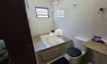 Casa com 3 dormitórios à venda, 90 m² por R$ 550.000,00 - Vila Guilhermina - Praia Grande/SP