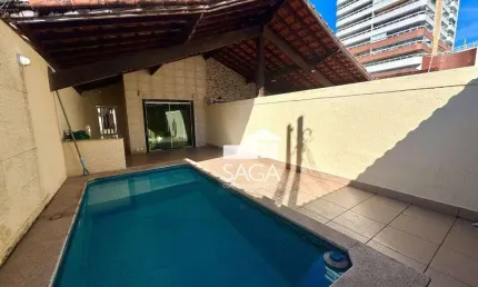 Casa com 3 dormitórios à venda, 112 m² por R$ 750.000,00 - Vila Guilhermina - Praia Grande/SP