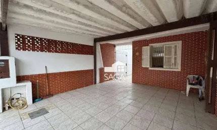 Casa com 2 dormitórios à venda por R$ 380.000,00 - Maracanã - Praia Grande/SP