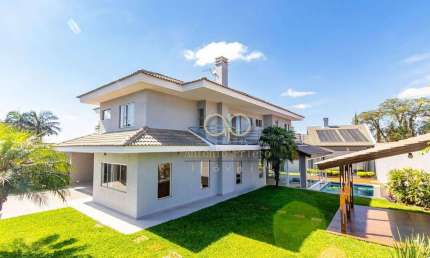 CASA COM PISCINA E ESPAÇO GOURMET EM SANTA FELICIDADE
