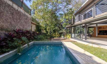 Casa com 3 dormitórios à venda, 450 m² por R$ 3.300.000,00 - Condomínio Chácara Flora - Valinhos/SP