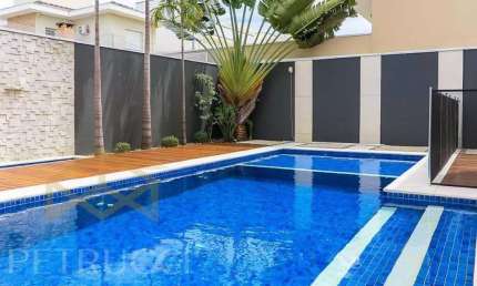 Casa com 3 dormitórios, 293 m² - venda por R$ 3.090.000,00 ou aluguel por R$ 17.949,00 - Swiss Park - Campinas/SP