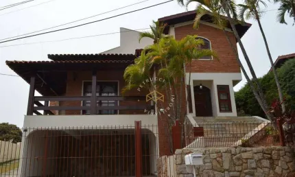Casa com 4 dormitórios à venda, 386 m² por R$ 1.700.000,00 - Condomínio Estância Marambaia - Vinhedo/SP