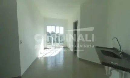 apartamento de dois dormitórios sendo um suíte com uma vaga de garagem.