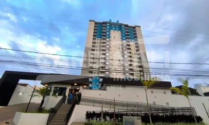 apartamento de dois dormitórios com uma vaga de garagem.