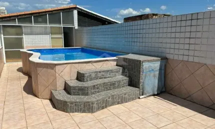 Lindo Sobrado Geminado na Vila Guilhermina, com 3 suítes, confira na imobiliária em Praia Grande.