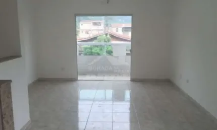 Casa sobreposta alta no canto do forte, 2 dormitórios, confira na imobiliária em praia grande.