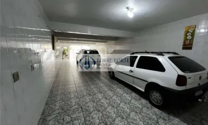 ótimo terreno com 2 casas com total de 3 dormitórios, 6 vagas de carro