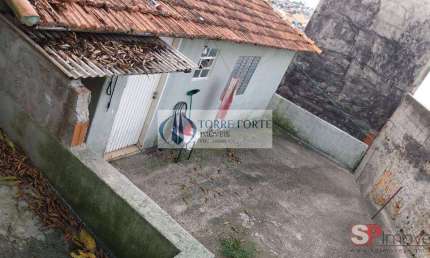 Terreno com casa construida com 350 metros no Parque do Carmo.