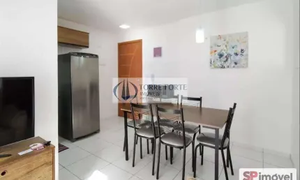 Apartamento com 2 dormitorios 1 vaga , varanda na aviação praia grande .