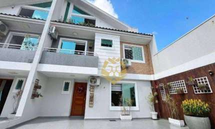 Sobrado com 3 dormitórios para alugar, 132 m² por R$ 5.385,00/mês - Uberaba - Curitiba/PR