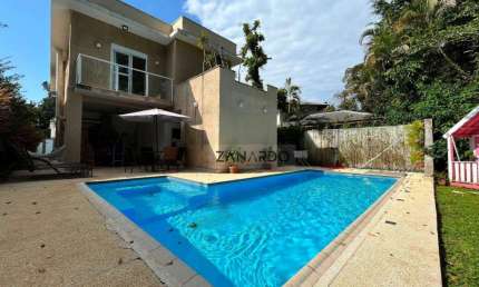 Casa em condomínio fechado com 4 quartos para alugar na Avenida Orla, 100, Riviera de São Lourenço, Bertioga