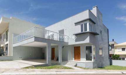 Casa em condomínio fechado com 3 quartos à venda na Rua Ivo Walter Kern, 599, Hípica, Porto Alegre por R$ 1.100.000