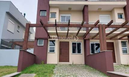 Casa com 3 quartos à venda na Rua Senador Mondin, 34, Hípica, Porto Alegre por R$ 855.000