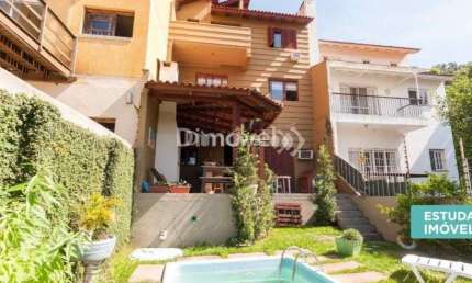 Casa com 4 quartos à venda na Rua Professor Antônio José Remião, 300, Espírito Santo, Porto Alegre por R$ 680.000