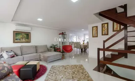 Casa em condomínio fechado com 3 quartos à venda na Avenida Coronel Marcos, 500, Pedra Redonda, Porto Alegre por R$ 990.000