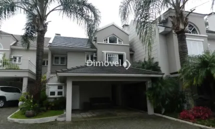 Casa em condomínio fechado com 3 quartos à venda na Avenida Coronel Marcos, 483, Pedra Redonda, Porto Alegre por R$ 1.350.000