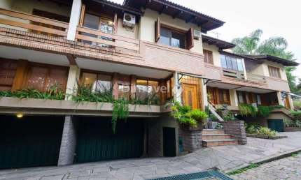 Casa em condomínio fechado com 3 quartos à venda na Rua Ernesto Paiva, 46, Tristeza, Porto Alegre por R$ 1.490.000