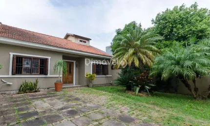 Casa com 3 quartos à venda na Rua Jayme Saul de Borba, 40, Guarujá, Porto Alegre por R$ 650.000
