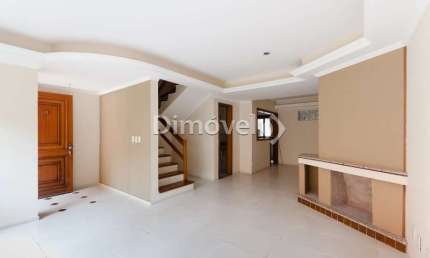 Casa em condomínio fechado com 3 quartos à venda na Rua Caeté, 525, Vila Assunção, Porto Alegre por R$ 990.000