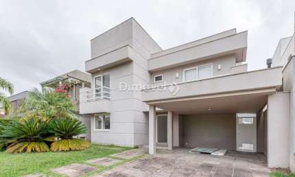 Casa em condomínio fechado com 4 quartos à venda na Avenida Juca Batista, 8000, Belém Novo, Porto Alegre por R$ 2.990.000