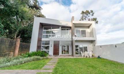Casa em condomínio fechado com 3 quartos à venda na Rua Francisco Solano Borges, 200, Hípica, Porto Alegre por R$ 1.065.000
