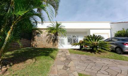 Casa com 4 quartos à venda na Avenida Arlindo Pasqualini, 413, Jardim Isabel, Porto Alegre por R$ 1.150.000