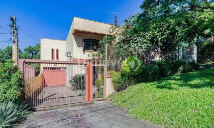 Casa com 4 quartos à venda na Avenida Capivari, 165, Cristal, Porto Alegre por R$ 997.500