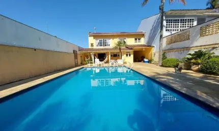 Casa com 4 quartos à venda na Avenida Saul Nonnenmacher, 112, Ipanema, Porto Alegre por R$ 1.350.000