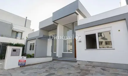 Casa em condomínio fechado com 3 quartos à venda na rua eroni soares machado, 300, hípica, porto alegre por r$ 599.000
