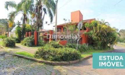 Casa com 4 quartos à venda na Rua General Tadeusz Kosciuszko, 160, Jardim Isabel, Porto Alegre por R$ 1.300.000