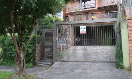Casa com 3 quartos à venda na Rua Edgar Luiz Schneider, 490, Jardim Isabel, Porto Alegre por R$ 1.290.000