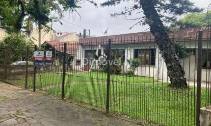 Casa com 3 quartos à venda na Rua Chico Pedro, 789, Camaquã, Porto Alegre por R$ 750.000