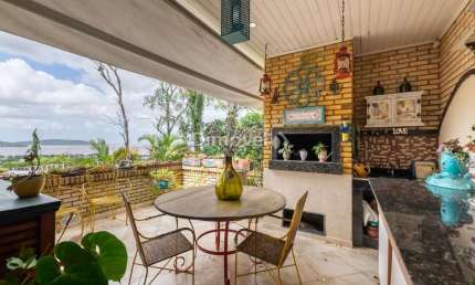 Casa em condomínio fechado com 5 quartos à venda na Rua Doutor Arnaldo da Silva Ferreira, 450, Jardim Isabel, Porto Alegre por R$ 1.500.000