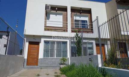 Casa com 2 quartos à venda na Rua Ilari Arlindo Basei, 204, Guarujá, Porto Alegre por R$ 420.000