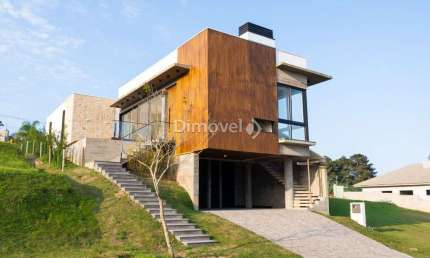 Casa em condomínio fechado com 4 quartos à venda na Estrada das Três Meninas, 1400, Vila Nova, Porto Alegre por R$ 1.849.000