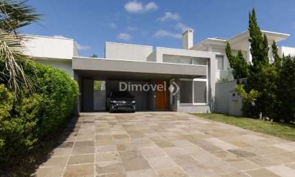 Casa em condomínio fechado com 3 quartos à venda na Avenida Juca Batista, 8000, Belém Novo, Porto Alegre por R$ 1.175.000