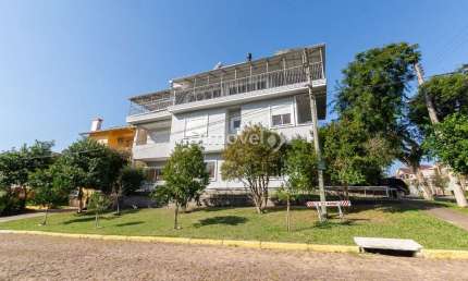 Casa em condomínio fechado com 4 quartos à venda na Rua Doutor Campos Velho, 1245, Cristal, Porto Alegre por R$ 1.300.000
