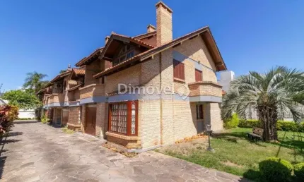 Casa em condomínio fechado com 3 quartos à venda na Rua General Rondon, 461, Tristeza, Porto Alegre por R$ 850.000