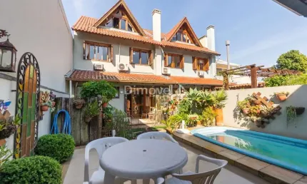 Casa com 3 quartos à venda na Rua Doutor Pio Ângelo, 49, Ipanema, Porto Alegre por R$ 950.000